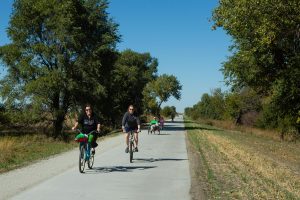 People ride along the hike/bike trail at Fort Kearny State Recreation Area.